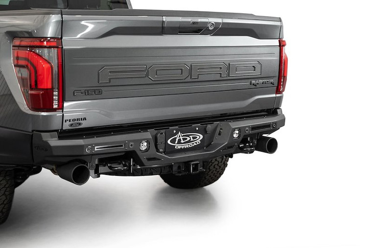 Fits 2021-2024 Ford F-150 Addictive Desert Designs Bumper R210121090103 Rock Fighter; One Piece Design; Direct-Fit; Bolt-On; Mounting Hardware Included; Compatible With OE Hitch and Backup Camera; With Parking Sensor Cutouts; Retains OE D-Ring Mounts