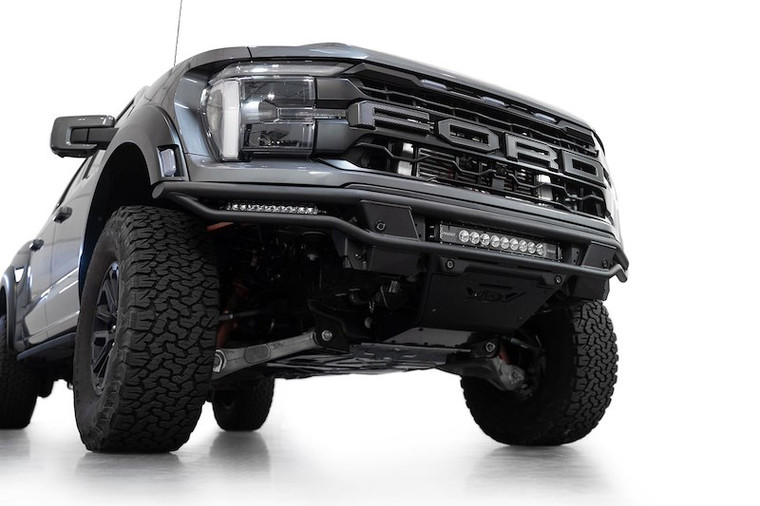 Fits 2021-2024 Ford F-150 Addictive Desert Designs Bumper F210373200103 Race Series; One Piece Design; Direct-Fit; Low Profile Design; Mounting Hardware Included; Without Grille Guard; Without Winch Mount; Retains OE Tow Hooks