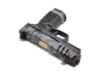 Close-up angled view of the FN 509 CC Edge XL custom Cerakote slide featuring Gotham Camo, revealing multiple shades of graphite, charcoal, and tungsten gray. High-detail image emphasizes the texture, depth, and precision masking of the custom Cerakote application.