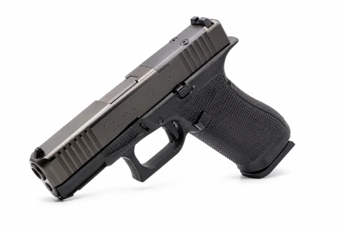 Factory GLOCK 45 Gen6 Optics Ready 9mm displayed on a seamless white studio backdrop, highlighting the compact slide, full-size frame, GLOCK Marksman Barrel, enhanced Gen6 ergonomics, aggressive front and rear slide serrations, and factory optics-ready configuration.