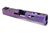 High-end custom Glock slide featuring Amethyst Nova Cerakote with luminous purple pearl effects, reflective gloss coating, and dynamic color transitions against a dark cinematic backdrop.