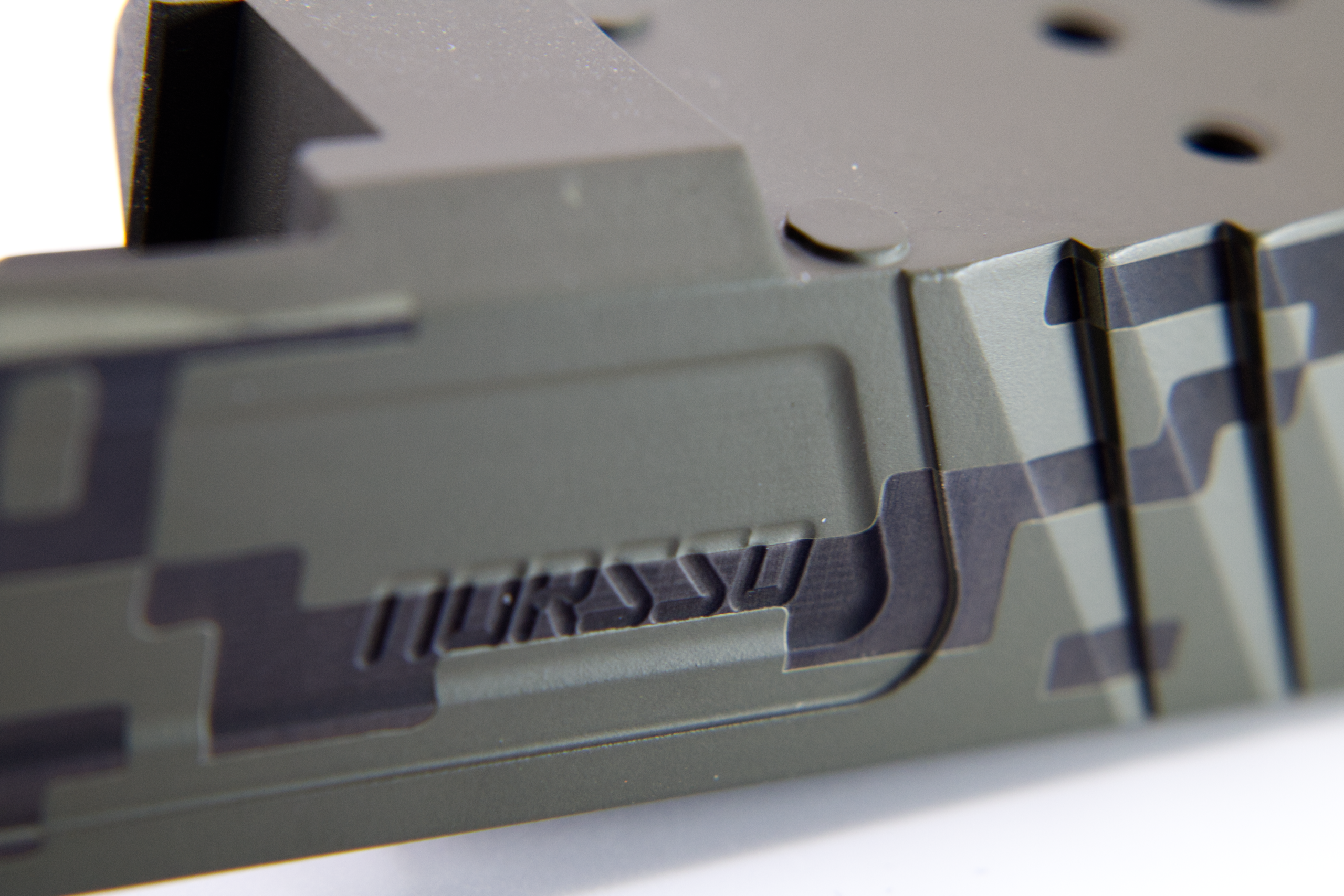 Laser Engraving vs. Laser Etching on Cerakoted & Factory Finished Slides