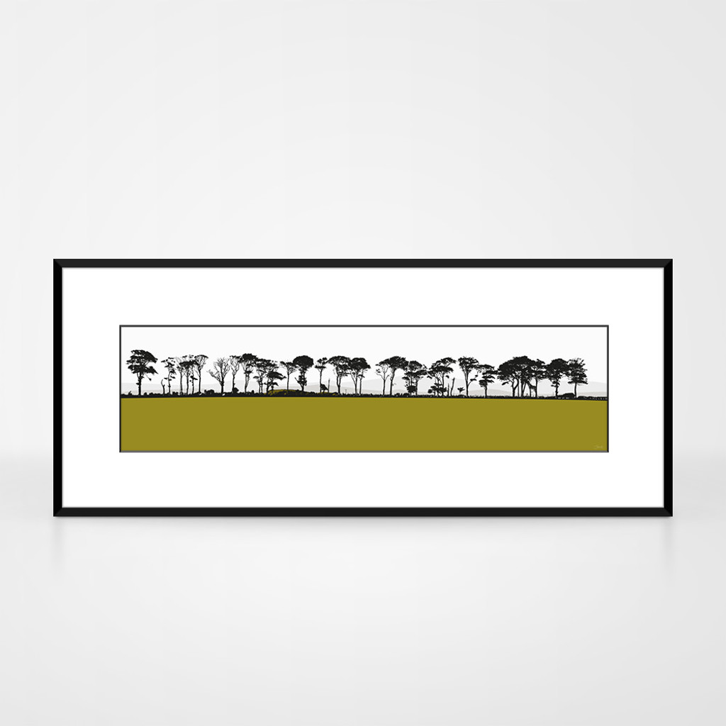 Landscape print of Northumberland countryside by designer Jacky Al-Samarraie.  The print colour is green. The print is shown in a frame for reference.