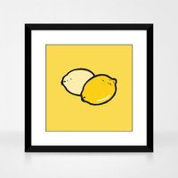 Lemon fruit print in a black wood frame by Jacky Al-Samarraie.