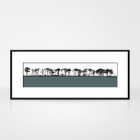 Landscape print of Northumberland countryside by designer Jacky Al-Samarraie.  The print colour is slate.  The print is shown in a frame for reference.