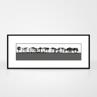 Landscape print of Northumberland countryside by designer Jacky Al-Samarraie.  The print colour is grey.  The print is shown in a frame for reference.