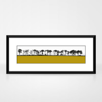 Landscape print of Northumberland countryside by designer Jacky Al-Samarraie, mounted and framed. The print colour is mustard.