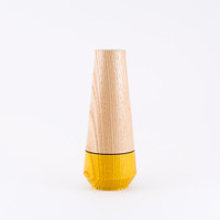 Yellow wood stem vase by designer Jacky Al-Samarraie