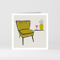 A modern graphic greeting card of cocktail chairs and a martini glass by designer Jacky Al-Samarraie