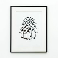 Framed Penguin print on wall - by Jacky Al-Samarraie