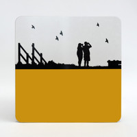 Bird watching at Cley marshes in Norfolk. Melamine table mat in mustard by Jacky Al-Samarraie.