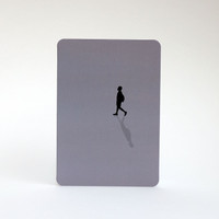 Man walking silhouette greeting card by Jacky Al-Samarraie