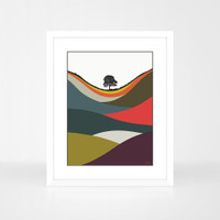 Sycamore Gap Multicoloured landscape print by designer Jacky Al-Samarraie, in a white frame.