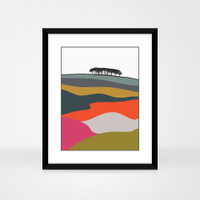 Guiseley, Leeds Multicoloured landscape print by designer Jacky Al-Samarraie, in a black frame.