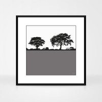 Landscape print of Anglesey, Wales by designer Jacky Al-Samarraie. The print is shown in a frame for reference.