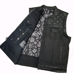 Unik black denim and cowhide leather club vest with black and white paisley lining Unik black denim and cowhide leather club vest with black and white paisley lining