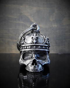 USA-made 3D pewter King Skull motorcycle guardian bell with detailed crown design, nickel-plated split ring, and black velvet pouch USA-made 3D pewter King Skull motorcycle guardian bell with detailed crown design, nickel-plated split ring, and black velvet pouch