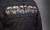 First MFG textile motorcycle jacket with skull artwork across back First MFG textile motorcycle jacket with skull artwork across back