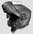 Daytona Helmets Gun Metal Grey Metallic modular motorcycle helmet with chin bar flipped up showing dual shield system and DOT-certified design Daytona Helmets Gun Metal Grey Metallic modular motorcycle helmet with chin bar flipped up showing dual shield system and DOT-certified design