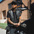 Model Wearing Unik Short Collarless Leather Motorcycle Vest with Zipper and Snap Front