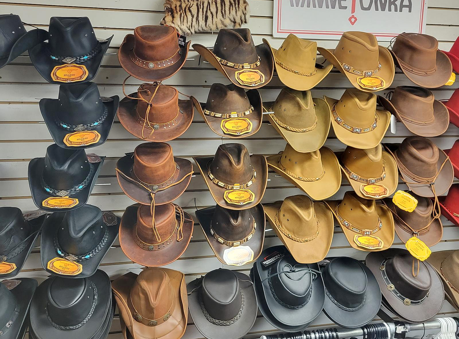 Leather western hats in brown and black on display at Leather Bound NJ in New Jersey