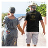 man walking with wife wearing US Veteran Southeast Asia Tour Dragon Vintage Back T-shirt