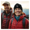 woman wearing Beanie with Embroidered American Veteran Patch out on a hike