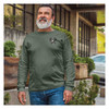 man walking down the street wearing US Veteran Olive Drab Long Sleeve T-Shirt with DD-214 and Eagle Graphic