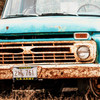 army veteran license plate frame on old car