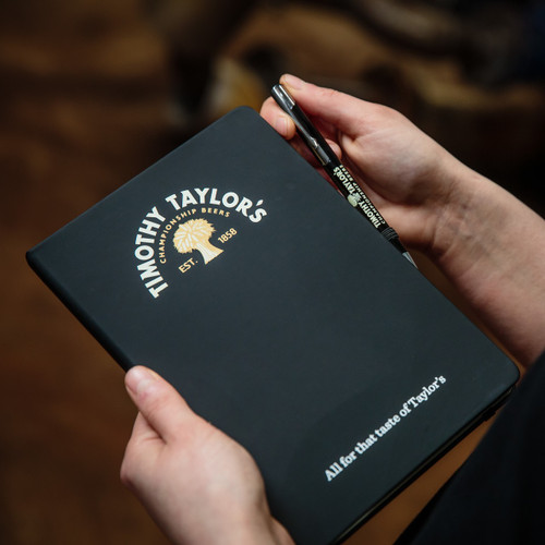 Timothy Taylor's notebook and pen Timothy Taylor's notebook and pen