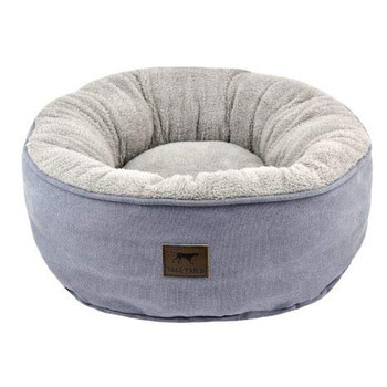Small Donut Bed measuring 18" x 18" Recommended for dogs up to 25lbs who enjoy nesting, burrowing and curling while resting. Reversible design allows for custom comfort. Filled with 100% post consumer recycled poly-fiber. Pair with a Tall Tails Blanket for an extra layer of great comfort. Machine washable and dryable.