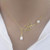 Style: 2 Pearl Lariat,Color: Yellow Gold - Pearls Of Joy Lariat Necklace In White Gold And Yellow G