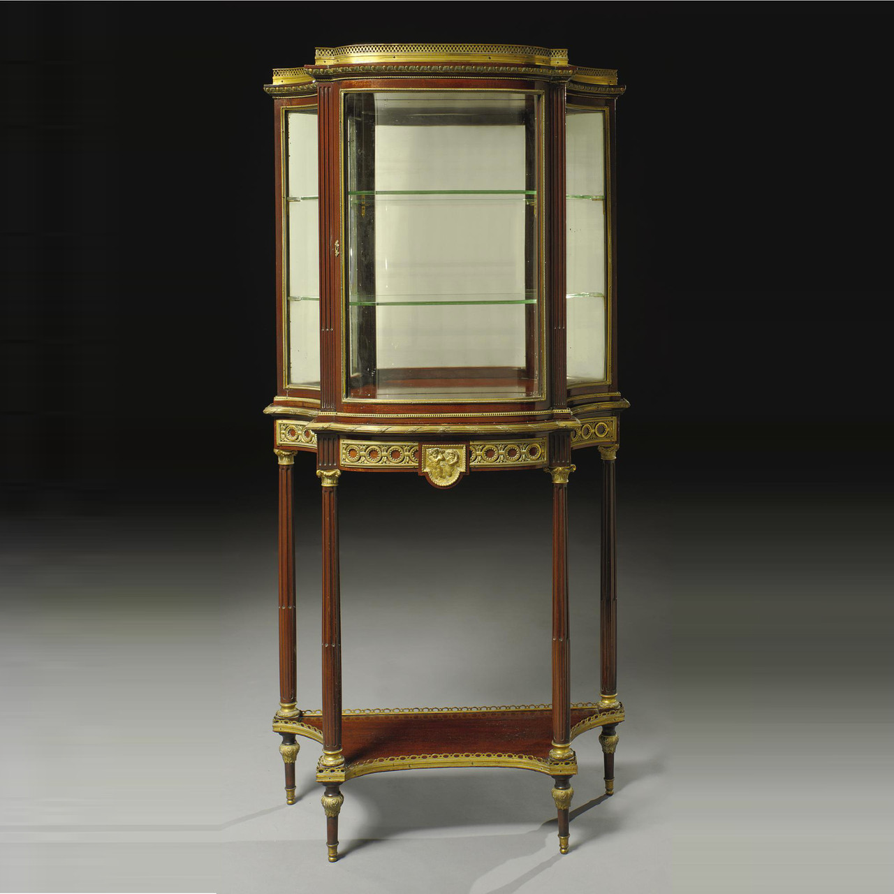 An Exquisite Louis XVI Style Gilt Bronze Mounted Mahogany Vitrine