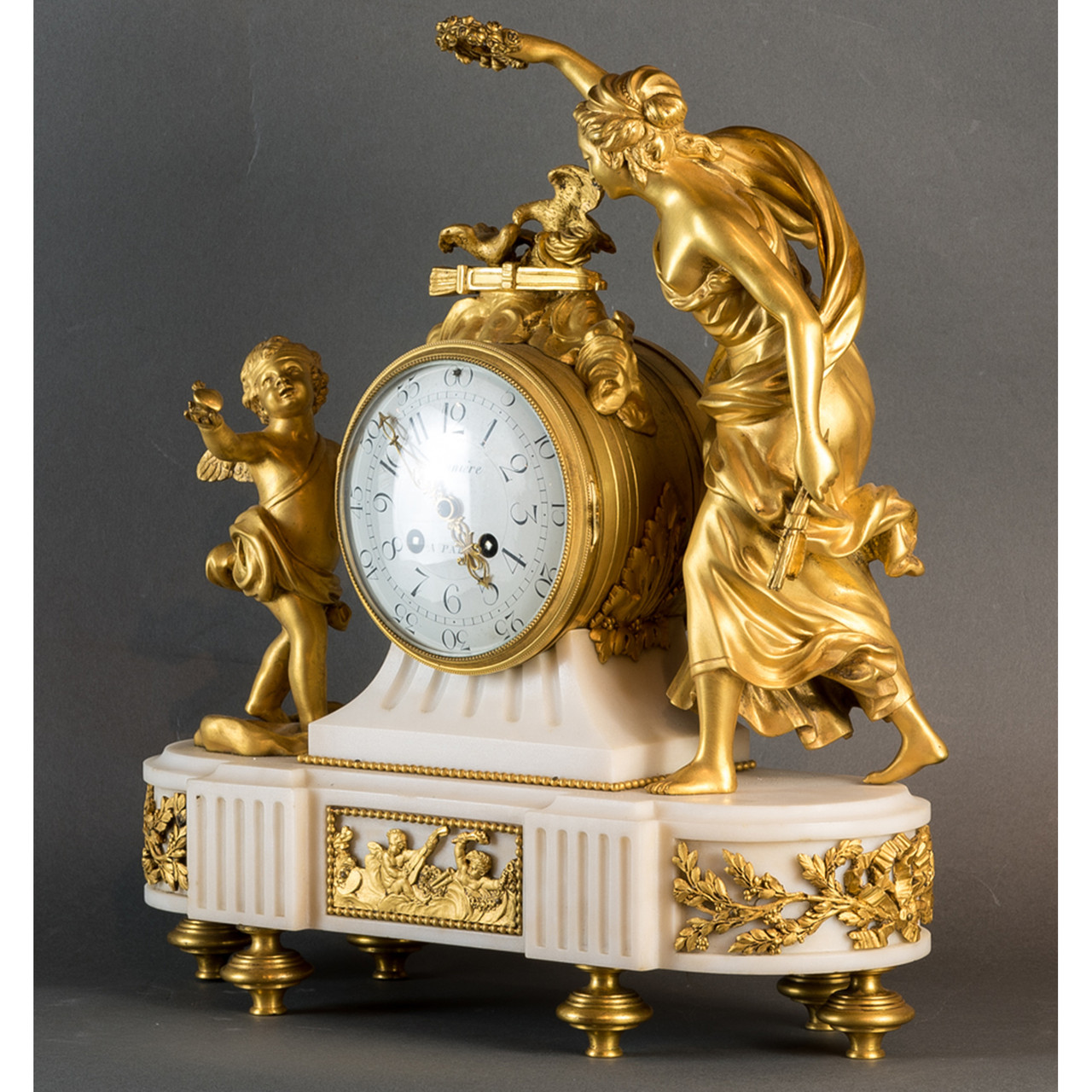 A Fine Gilt Bronze and Marble Mantel Clock with Putti by Maniere