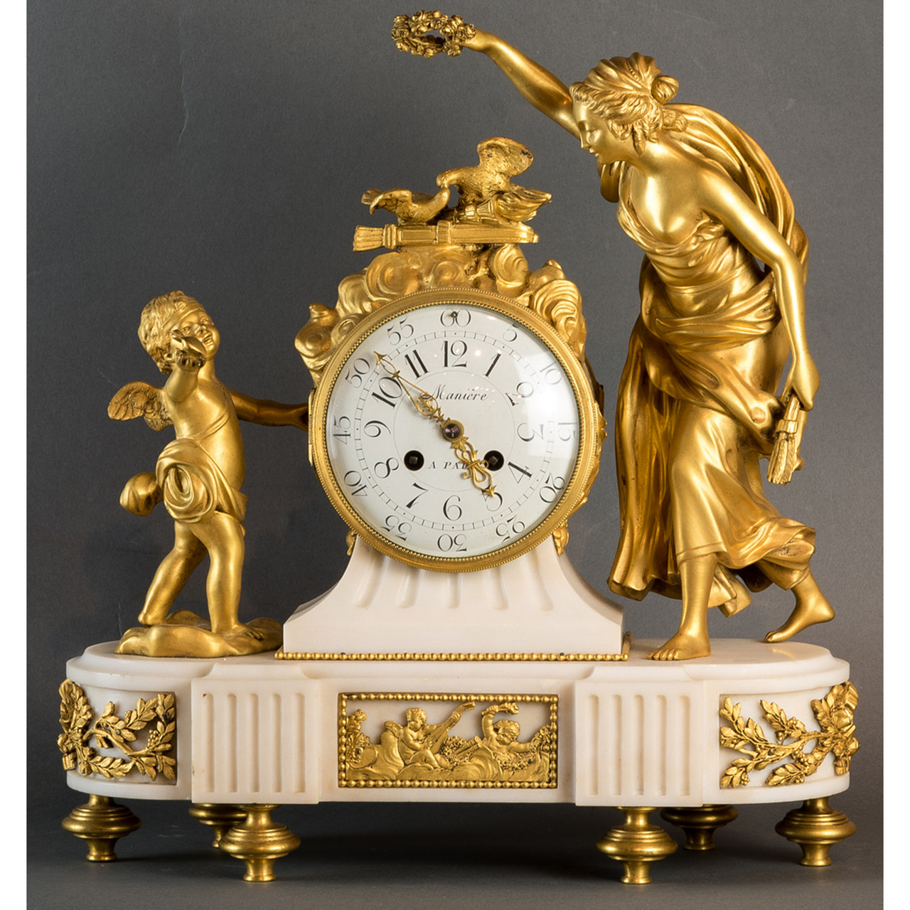 A Fine Gilt Bronze and Marble Mantel Clock with Putti by Maniere