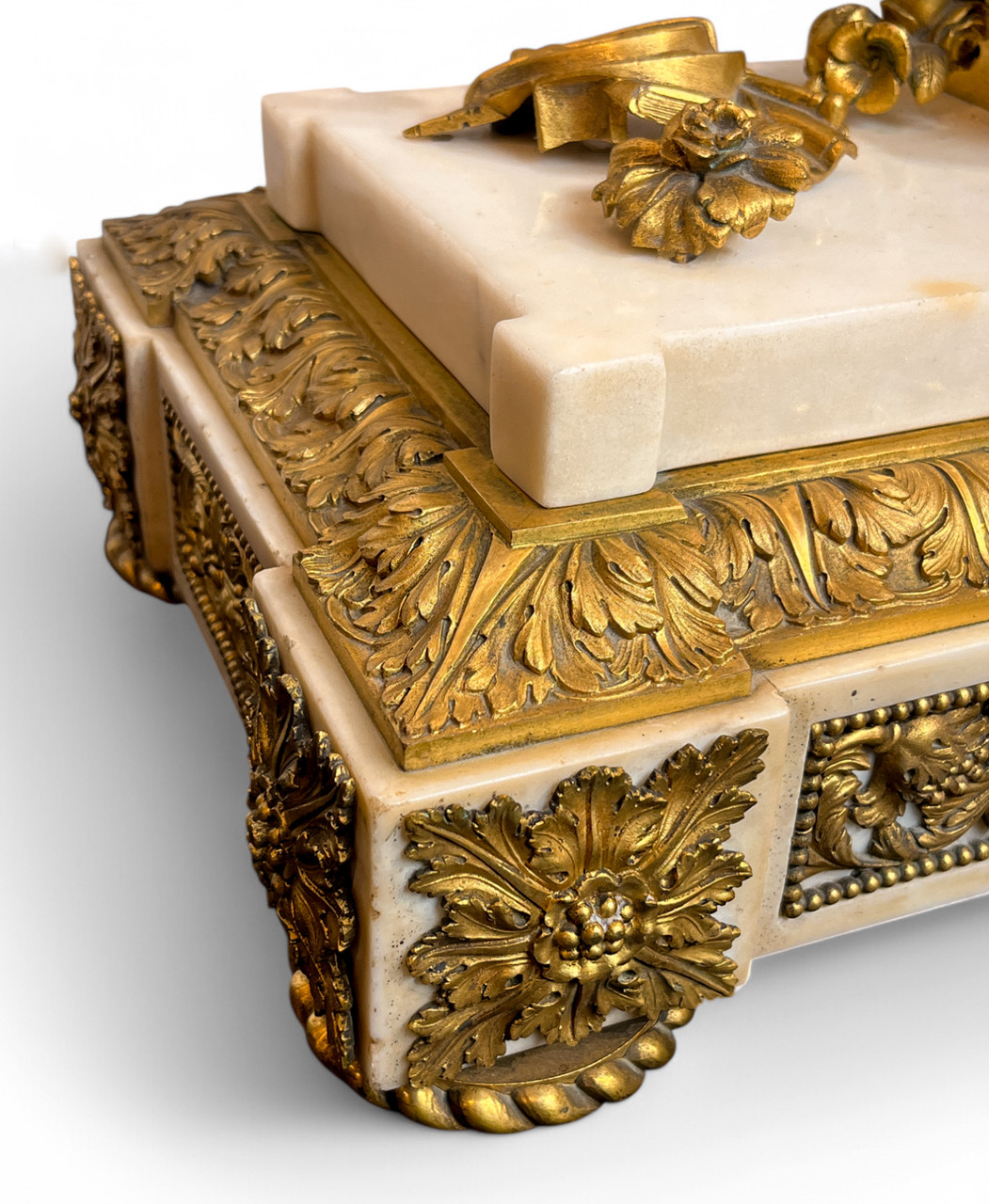 A Louis XVI Ormolu and White Marble Mantel Clock of Cupid
