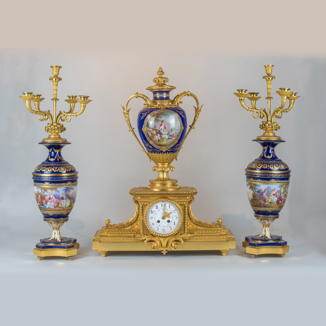 Antique French Sèvres Gilt Bronze and Porcelain Mantel Clock Garniture