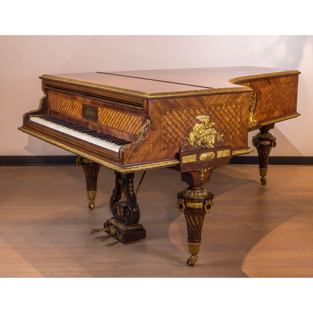 An Extremely Fine Quality Ormolu-Mounted Amaranth, Kingwood and