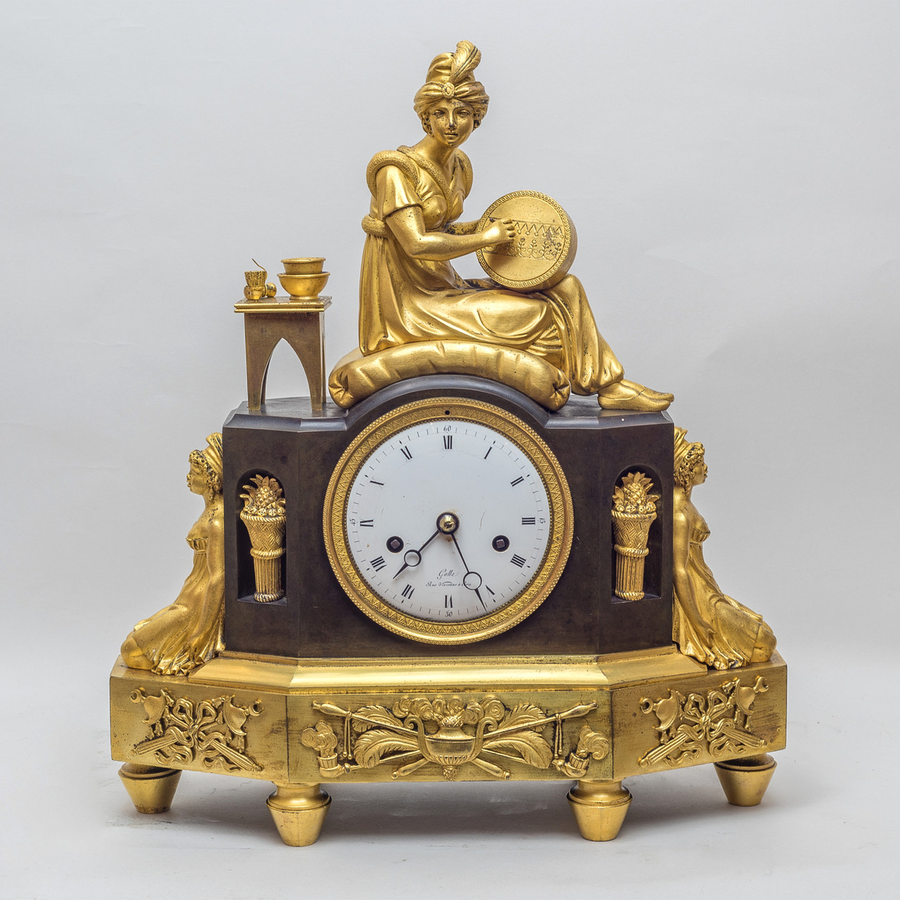 A Fine Quality French Empire Ormolu Figural Mantel Clock by Claud