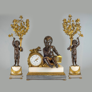 A French Ormolu Mounted and Patinated Bronze Three-Piece Clockset and Marble by H. LUPPEN & Cie. A French Ormolu Mounted and Patinated Bronze Three-Piece Clockset and Marble by H. LUPPEN & Cie.