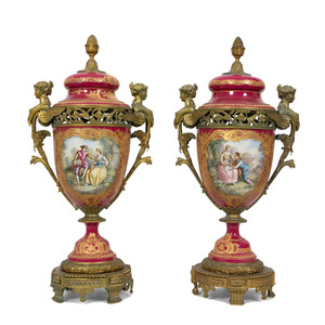 A Pair of Gilt Bronze Mounted Sèvres-Style Porcelain Covered Urns A Pair of Gilt Bronze Mounted Sèvres-Style Porcelain Covered Urns