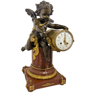 French Ormolu Patinated Bronze and Rouge Marble Putto Mantel Clock