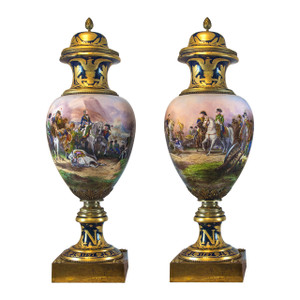 A pair of Hand Painted Monumental Ormolu-mounted Sèvres Porcelain Cobalt-Blue Napoleonic Vases and Covers by H. Desprez A pair of Hand Painted Monumental Ormolu-mounted Sèvres Porcelain Cobalt-Blue Napoleonic Vases and Covers by H. Desprez