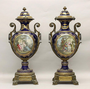 An Exquisite Pair of Poitevin Sèvres Cobalt Glazed Hand Painted Porcelain Urns An Exquisite Pair of Poitevin Sèvres Cobalt Glazed Hand Painted Porcelain Urns