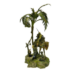 A fine cold-painted bronze multi-figural sculpture depicting Arabian trader on a camel by Franz Bergman