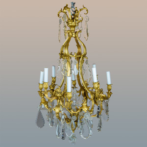 An Exquisite 19th Century Louis XV style Gilt-Bronze and Cut-Crystal Eight-light Chandelier An Exquisite 19th Century Louis XV style Gilt-Bronze and Cut-Crystal Eight-light Chandelier