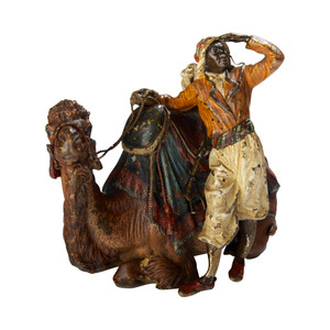 An Austrian Cold-painted Bronze Sculpture of a Camel Rider by Franz Bergman
