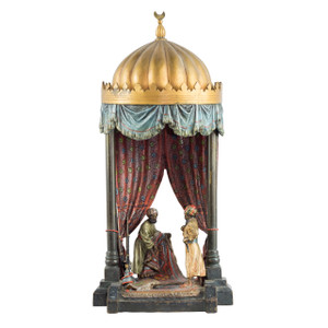 A Fine Austrian Cold-painted Bronze Figures of a Rug Merchant by Franz Bergman A Fine Austrian Cold-painted Bronze Figures of a Rug Merchant by Franz Bergman
