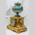 Gilt Bronze and Turquoise Sèvres Style Jeweled Porcelain Clock Set Gilt Bronze and Turquoise Sèvres Style Jeweled Porcelain Clock Set