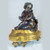 A Fine Quality Pair of French Gilt and Patinated Bronze Figural Chenets